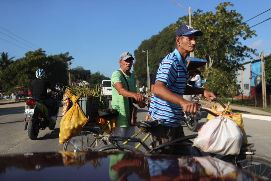 People crossing the street. Camagüey, Cuba.