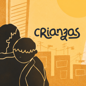 Niños contemplando la ciudad al atardecer